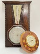 An Edwardian wall mounted barometer with Fahrenheit/Centigrade temperature indicator (h- 40cm),