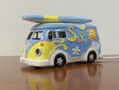 A hand painted ceramic table lamp modelled as a VW campervan. L28cm.