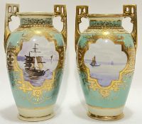 A pair of Japanese Noritake porcelain twin-handled vases decorated with coastal scenes of boats with