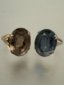 A 9ct gold dress ring set oval cut cairngorm in four claw setting, table shows signs of wear M/N and