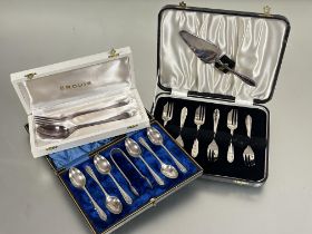 A boxed Epns two piece christening set, a boxed set of six Edwardian Epns tea spoons and tongs and a