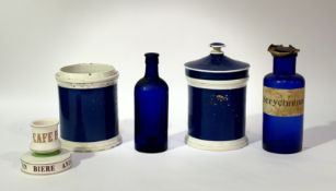 A mixed group of Apothecary/Chemist ware comprising, a blue clear glass bottle with ribbed panel