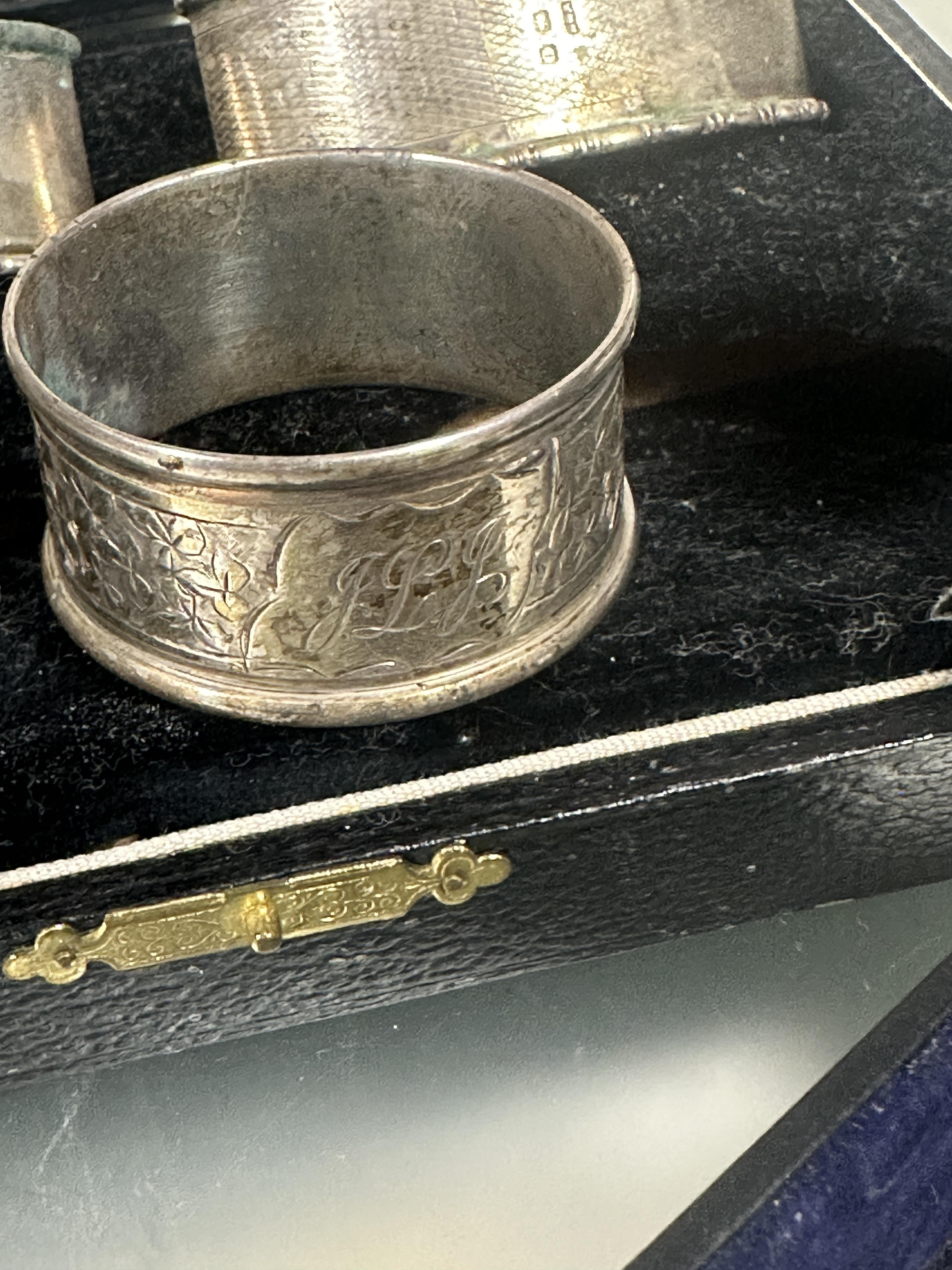 A boxed set of two Edwardian Birmingham silver navette shaped engine turned napkin rings L x 6.5cm - Image 2 of 4