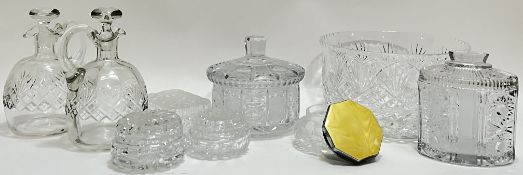 A group of cut crystal glassware comprising two bottle form decanters with trefoil rim (h- 23cm),