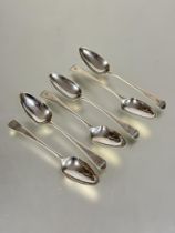 A set of six Georgian silver Old English pattern tea spoons with later engraved initial F makers