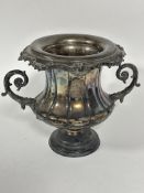 A 19thc Sheffield plated rococo style twin handled wine cooler with inset liner of outswept fluted