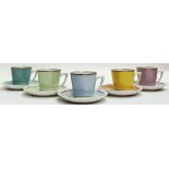 A Royal Copenhagen porcelain part Harlequin espresso set comprising five cups and saucers in various