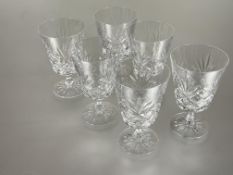 A set of six Edinburgh crystal red wine glasses with slice cut decoration, engraved mark verso no