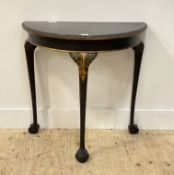 A Georgian style demi-lune console table, early 20th century the top with floral moulded edge