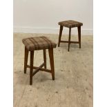 A pair of mid century oak stools, the seats upholstered in Abraham Moon wool. H50cm.