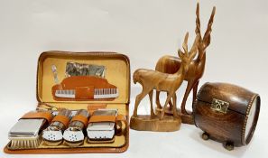 A leather cased gentleman's shaving set with engine turned accoutrements including comb, mirror,