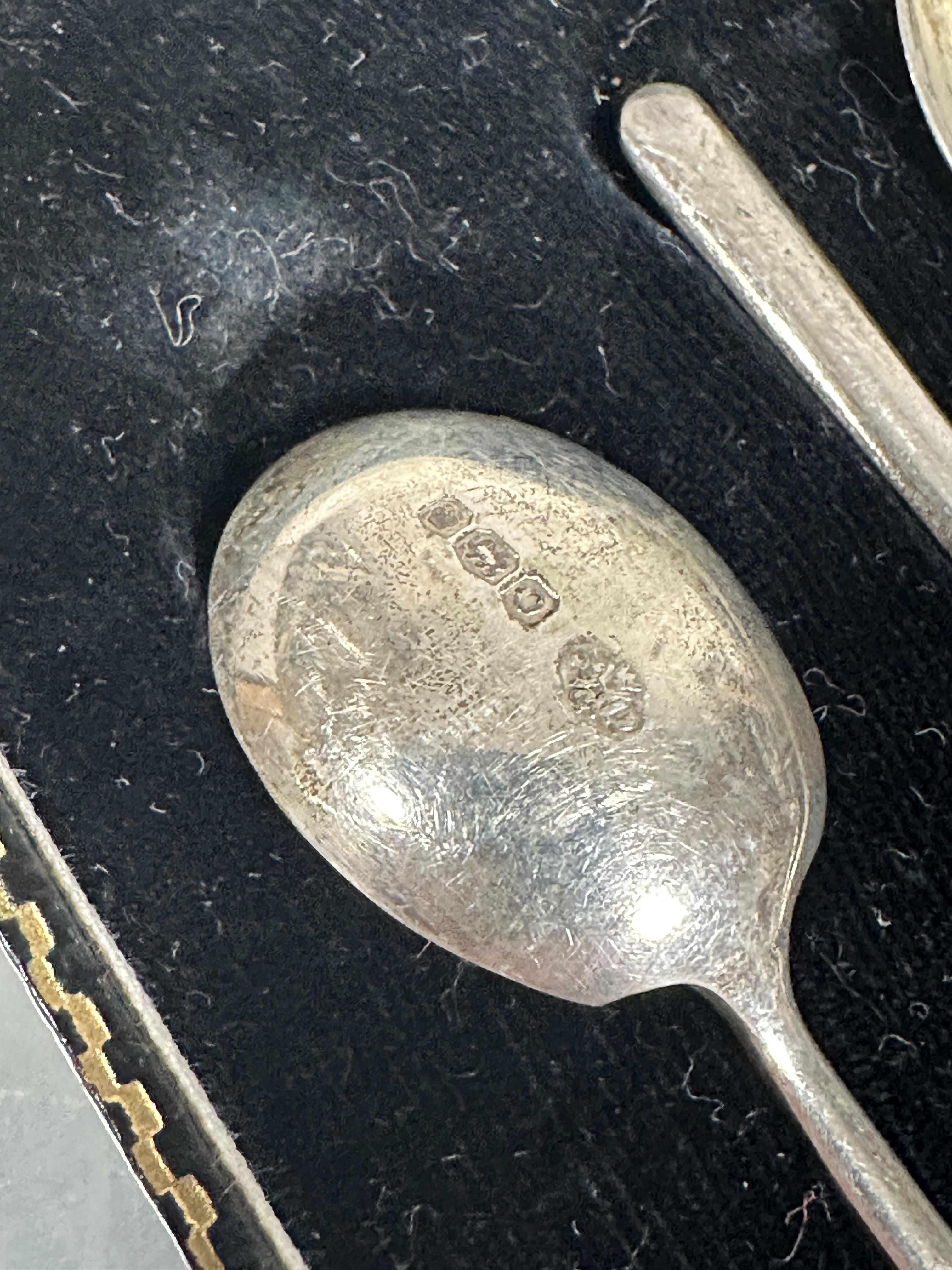 A boxed set of six Sheffield silver plain handled coffee spoons with pair of matching tongs  L x 8. - Image 2 of 2