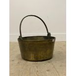 A substantial 19th century brass preserve pan with wrought iron swing handle. D40cm.