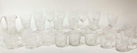 A collection of various glassware comprising a Edinburgh Crystal pitcher with thistle etching and