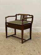 An Edwardian mahogany chair back piano stool, inlaid with figured walnut and boxwood stringing,