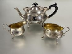 Leith Interest; a Birmingham silver gilt three piece tea service comprising tea pot with scalloped