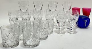 A mixed group of glassware comprising four stem cups/wine glasses (h- 17cm), eight fluted glasses, s