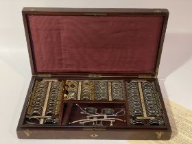 F Davidson & Co. an early 20th century Opticians tonometer set, 'The Schioltz Origional' with