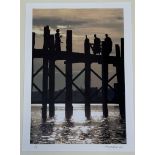 F.Price, A view of a bridge with Bhikkhus walking at sunset, photographic limited print 1/50, signed