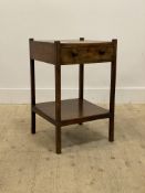 An early 19th century mahogany two tier wash stand / bedside table, fitted with a drawer and