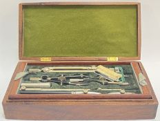 An inlaid wooden pencil case with W H Harling fitted instruments including compass etc... (w- 22.5cm