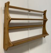 Ercol, a vintage blonde elm two height wall rack. H48cm, W97cm.