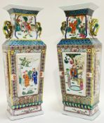 A large pair of Chinese polychrome enamel painted porcelain twin-handled vases