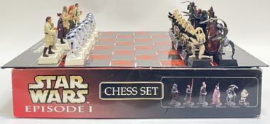 A boxed Star Wars Episode One chess set with pieces and board (missing one piece, w- 51cm)