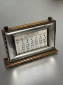 Property of the late Countess Haig , a Edwardian oak and Epns mounted slope front desk calendar of