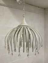 A contemporary seven branch pendent light fitting, with LED bulb holders and complete with chain and