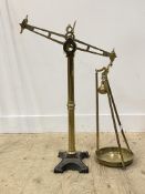 A good quality set of 19th century brass and cast iron balance scales, stamped 'White Bros & Co.'