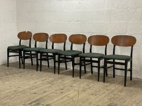A set of six mid century dining chairs, the curved oval teak back rest over herringbone covered seat
