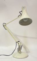 A Vintage anglepoise lamp, with conical shade and on a circular base, stamped 'Anglepoise lighting