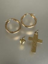 A pair of 9ct gold engraved hoop earrings D x 2cm,  a yellow metal heart charm and a 9ct gold