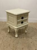 A French style cream finish bedside chest fitted with two drawers, raised on cabriole supports.