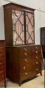 Property of the Late countess Haig, a George III mahogany bureau bookcase, the projecting cornice