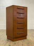 G-Plan, A mid century 'Fresco' teak chest fitted with six drawers, raised on an inset pedestal foot.