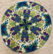 A Kashmiri hand stich wool chain rug of stylised floral design in vivid hues. D144cm.