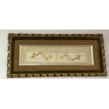 A linen work decorative panel, with hand-sticked floral sprays and lace boarder, in a wooden