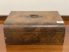 A Victorian burr walnut work box, the domed top with recessed brass handle opening to a well