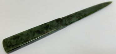 A plain nephrite jade letter opener of tapered form (l- 15.5cm)