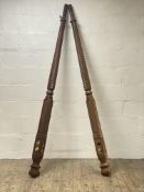 A pair of 19th century spiral turned mahogany four poster bed columns, H222cm.