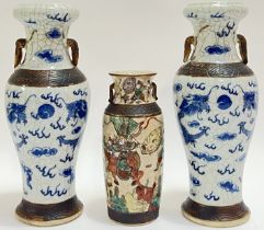 A pair of Chinese blue and white porcelain Nanjing ware crackle glaze baluster form vases