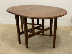 A mahogany drop leaf dining table, the oval top raised on square tapered swing supports. H79cm,
