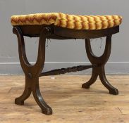 A Regency style stained hardwood stool with upholstered seat, raised on 'X' frame supports. H47cm,