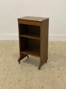 A mid 20th century mahogany side table by Herbert and Gibbs, fitted with a drawer above an open