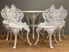A Victorian style cast iron garden suite, mid 20th century, comprising a set of four Coalbrookdale
