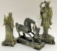 Three Chinese carved soapstone Daoist/Confucian figures, one with a horse and man (largest h- 25cm)