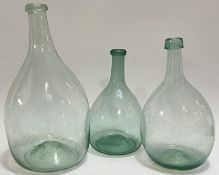 Three early American (18th/19th century) blown glass onion bottles (largest h- 31cm)