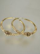 A pair of Eastern high carat gold hoop earrings with fine wire work decoration no signs of repairs